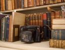 random picture of books and camera at the collection 